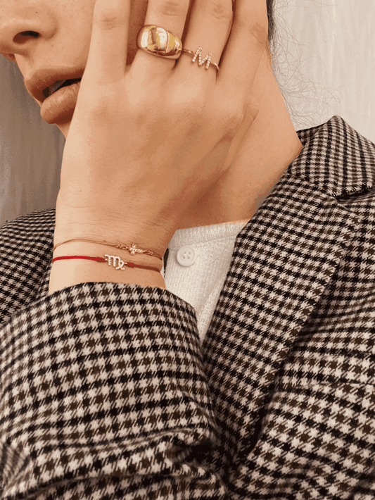 Stacking String of Love bracelets